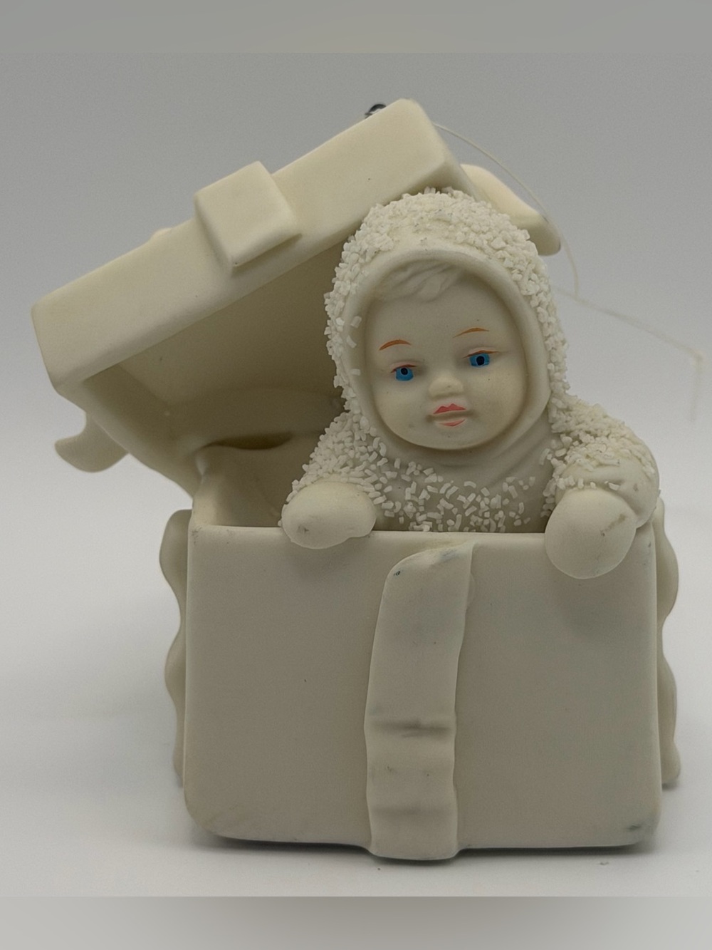 Department 56 Cream Baby in Gift Box Figurine with Blue Eyes